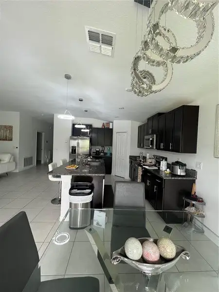 Furnished interior view inside a new home in North Park Isle, Plant City (Image 3).