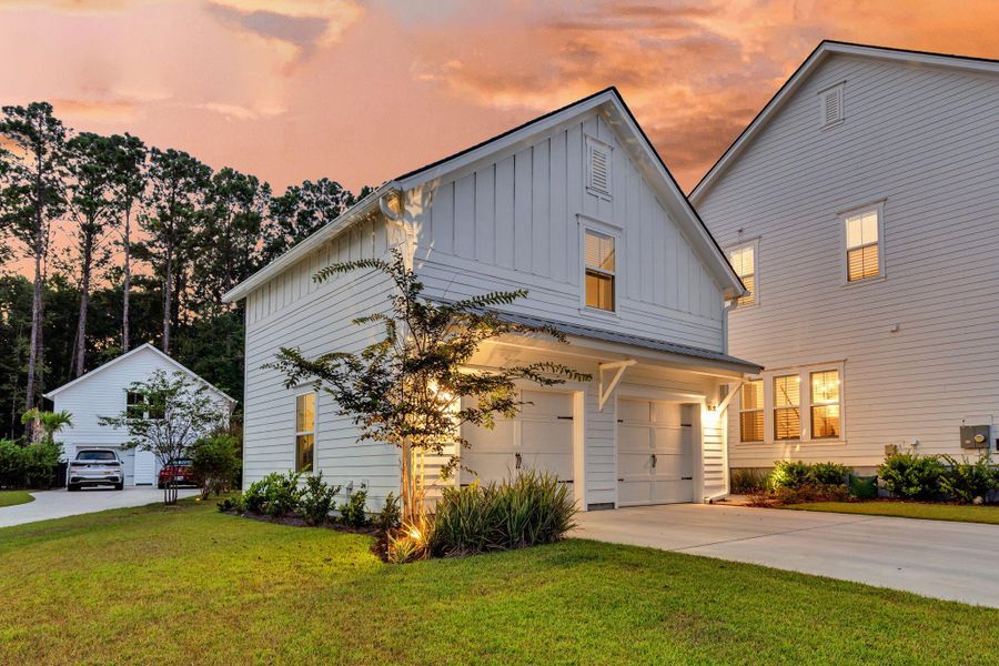 Front exterior of a new home in Carolina Park: Riverside, Mount Pleasant, SC, highlighting curb appeal (Image 22). Front exterior of a new home in Carolina Park: Riverside, Mount Pleasant, SC, highlighting curb appeal (Image 22).
