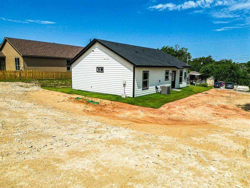 Exterior details and patio area of a home in , Granbury (Image 19).