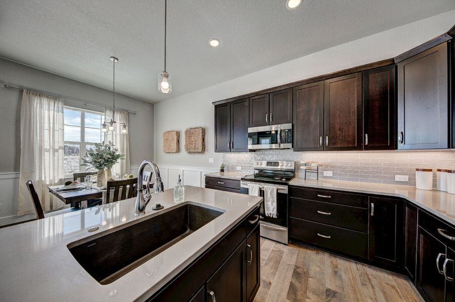 Representative furnished interior of a home built from the The Devon by Landmark Homes in The Lakes at Centerra, Loveland (Image 9). Representative furnished interior of a home built from the The Devon by Landmark Homes in The Lakes at Centerra, Loveland (Image 9).