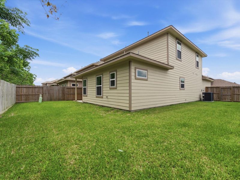 Exterior details and patio area of a home in , Houston (Image 4).