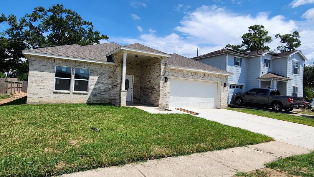 Front exterior of a new home in , Humble, TX, highlighting curb appeal (Image 12). Front exterior of a new home in , Humble, TX, highlighting curb appeal (Image 12).