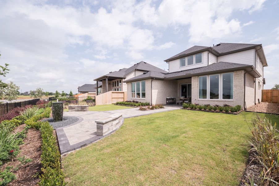 Representative exterior photo of a completed home built from the Verdin by Tri Pointe Homes in Pecan Ridge, Fulshear, TX (Image 27).