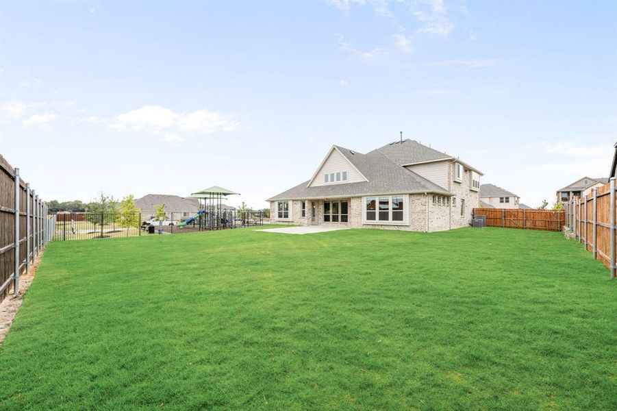 Exterior details and patio area of a home in Mockingbird Heights Classic 60, Midlothian (Image 21).