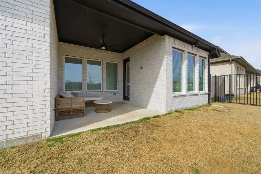 Exterior details and patio area of a home in Gideon Grove, Rockwall (Image 3).