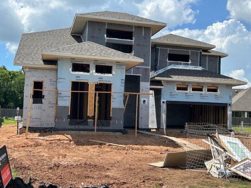 Modern exterior and a green belt on the rear provides a private back yard with comfortable surroundings. Modern exterior and a green belt on the rear provides a private back yard with comfortable surroundings.