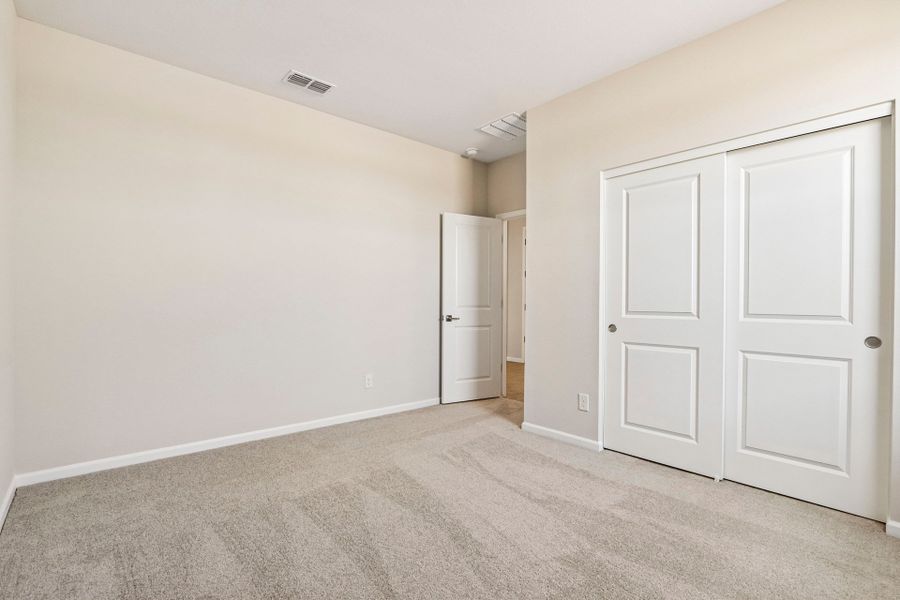 A room with white doors.