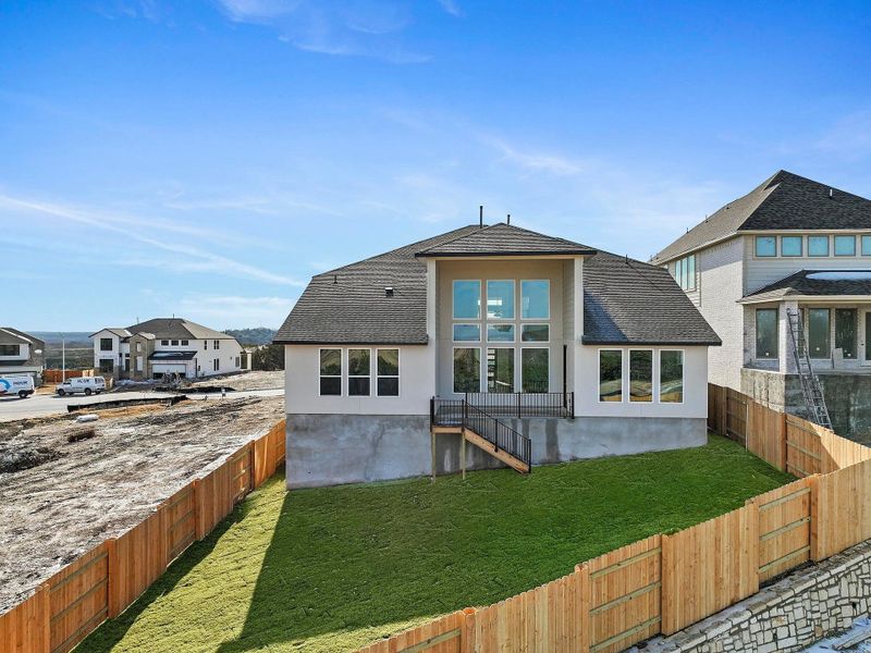 Exterior details and patio area of a home in Lariat, Liberty Hill (Image 24).