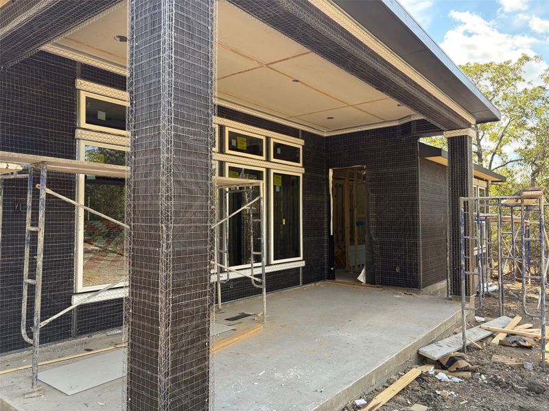 Exterior details and patio area of a home in The Colony- Pine Cove, Bastrop (Image 2). Exterior details and patio area of a home in The Colony- Pine Cove, Bastrop (Image 2).