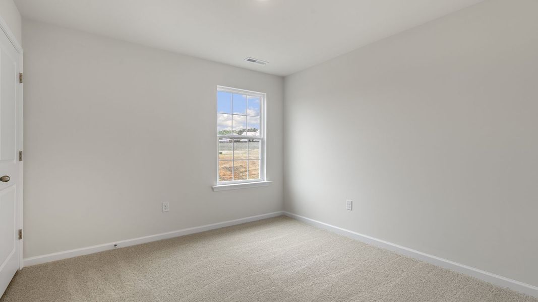 Spacious, unfurnished interior of a new home in The Grove at Matthews Landing, Fuquay Varina (Image 21).