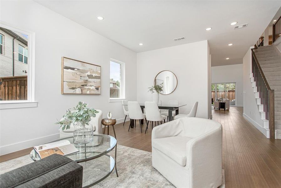 Living room with wood-type flooring