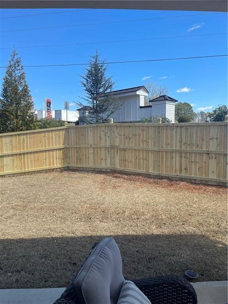 Exterior details and patio area of a home in Courtyards at Traditions, Cumming (Image 29).