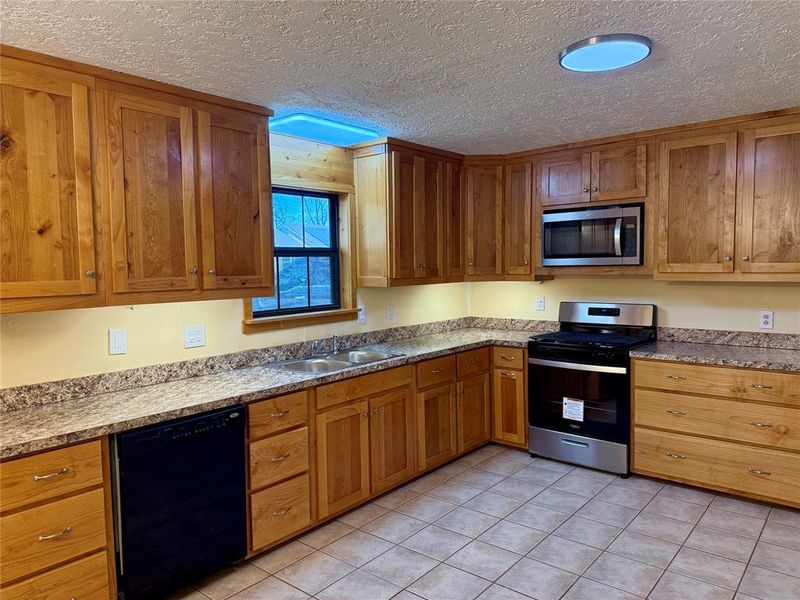 Furnished interior view inside a new home in , Whitney (Image 9).