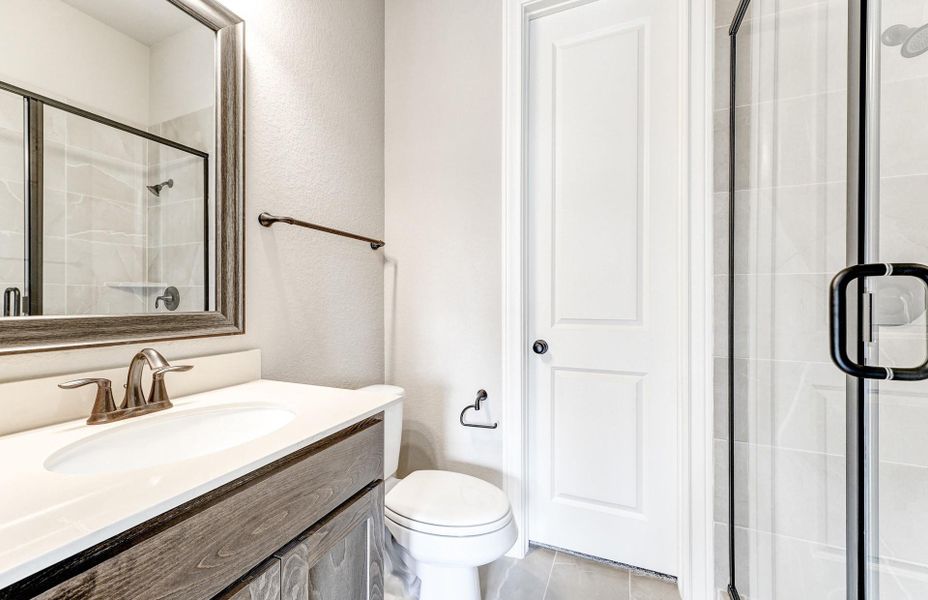 Furnished interior view inside a new home in The Woodlands Hills 65′, Willis (Image 28).