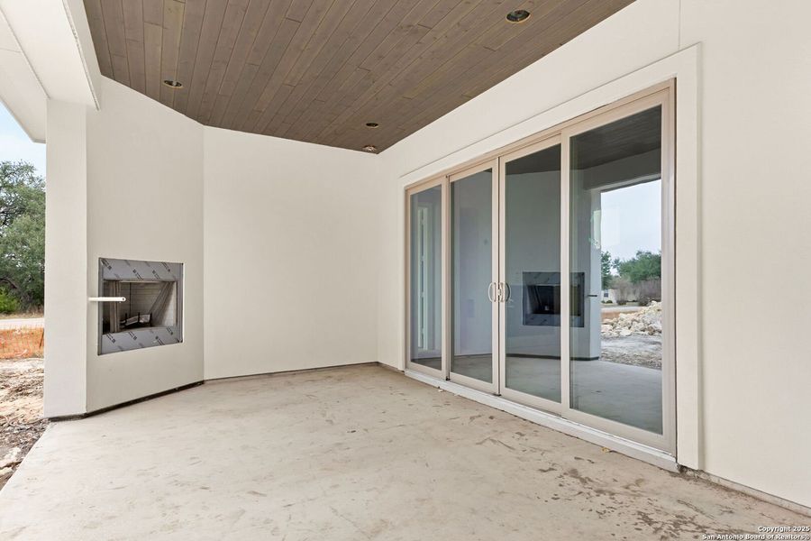 Exterior details and patio area of a home in , Spring Branch (Image 3).