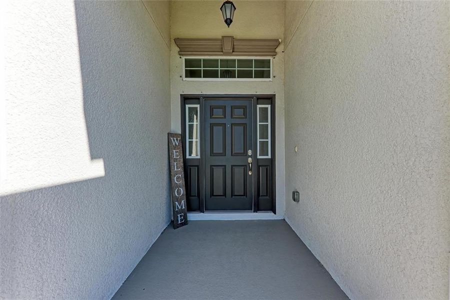 Exterior details and patio area of a home in Aviary at Rutland Ranch, Parrish (Image 23).