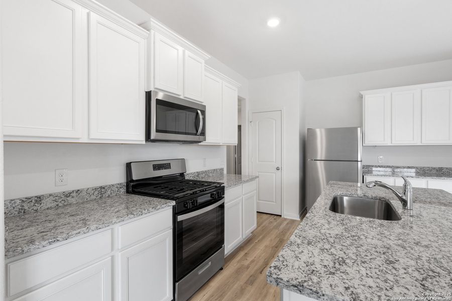 Furnished interior view inside a new home in Preserve at Medina, Von Ormy (Image 8).
