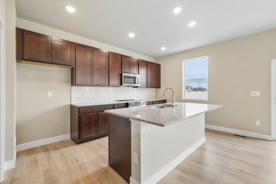 Furnished interior view inside a new home in The Trails at Aspen Ridge, Colorado Springs (Image 6).