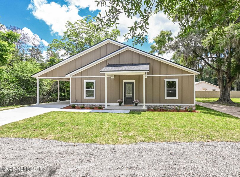 Front exterior of a new home in , Glen St. Mary, FL, highlighting curb appeal (Image 1). Front exterior of a new home in , Glen St. Mary, FL, highlighting curb appeal (Image 1).