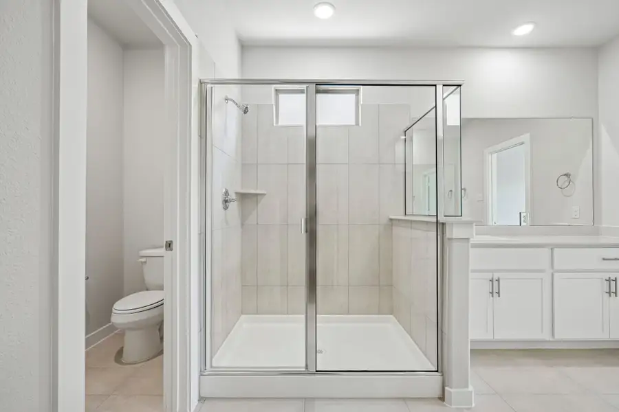 Primary Bathroom in the Wimbledon home plan by Trophy Signature Homes