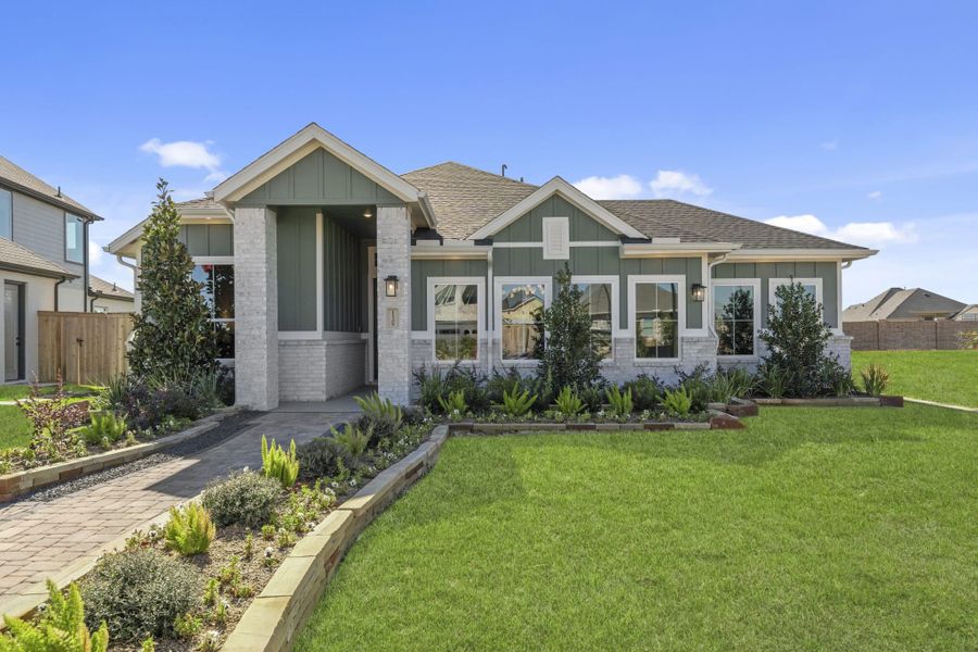Representative exterior photo of a completed home built from the Aubrey by Chesmar Homes in Sienna, Missouri City, TX (Image 28).