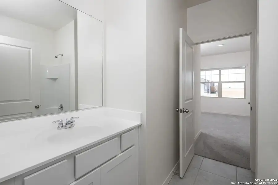 Furnished interior view inside a new home in Liberte, Converse (Image 9).