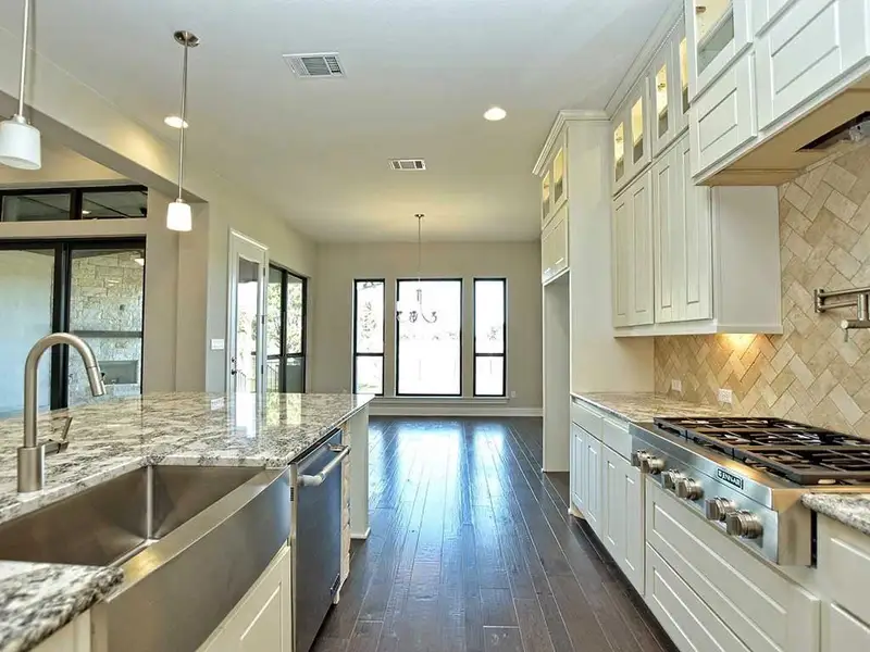 Representative furnished interior of a home built from the Santa Barbara II by Giddens Homes in Scofield Farms Estates, Georgetown (Image 70).