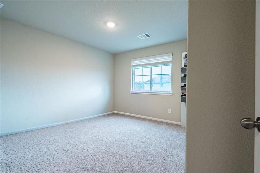 Spacious, unfurnished interior of a new home in River's Edge, Conroe (Image 39). Spacious, unfurnished interior of a new home in River's Edge, Conroe (Image 39).