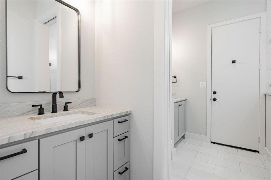 Example of builders Bathroom with vanity