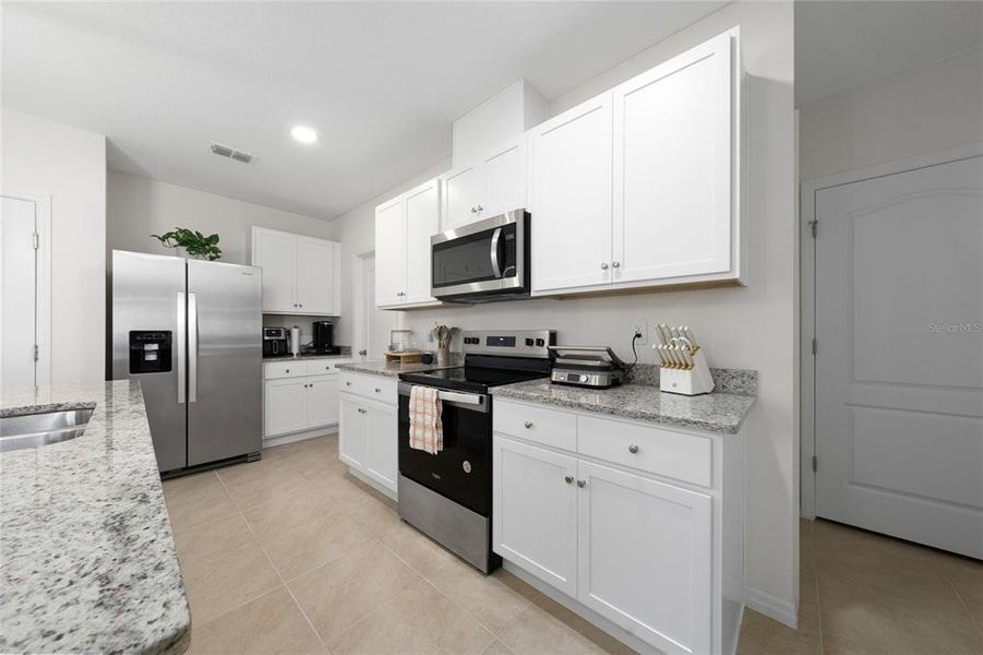 Furnished interior view inside a new home in Cascades, Davenport (Image 13).