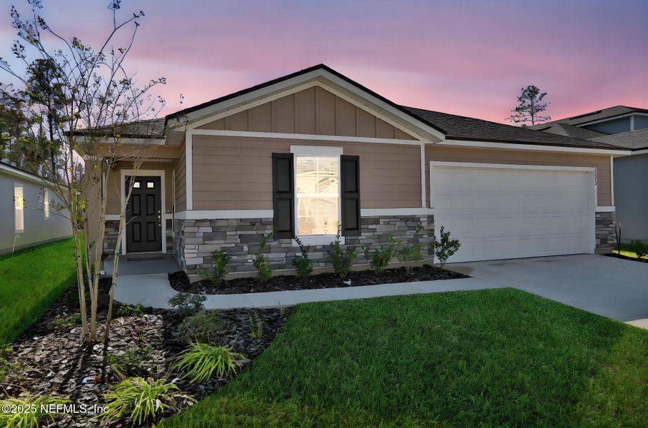 Front exterior of a new home in Wilford Oaks, Orange Park, FL, highlighting curb appeal (Image 26).