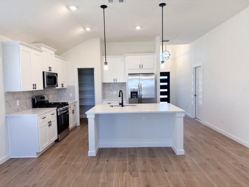 Furnished interior view inside a new home in Foxtail Palms, Manvel (Image 4).