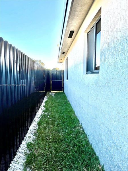 Exterior details and patio area of a home in , Miami Gardens (Image 3).