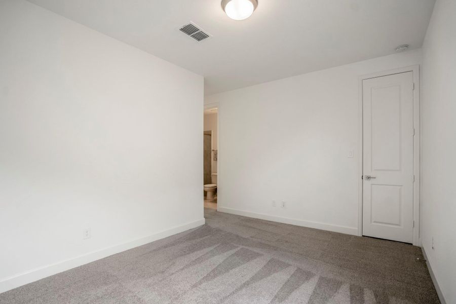 Spacious, unfurnished interior of a new home in Fulbrook on Fulshear Creek, Fulshear (Image 19).