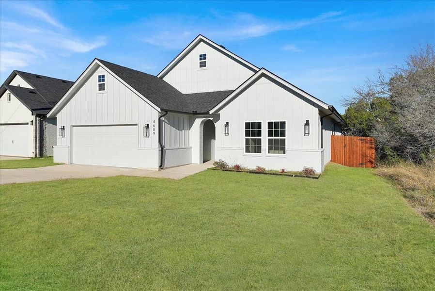 Front exterior of a new home in , Granbury, TX, highlighting curb appeal (Image 2). Front exterior of a new home in , Granbury, TX, highlighting curb appeal (Image 2).