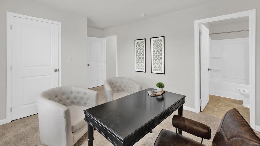 Representative furnished interior of a home built from the Mansfield by D.R. Horton in The Hideaway at Fox Meadows, Bluff City (Image 33).