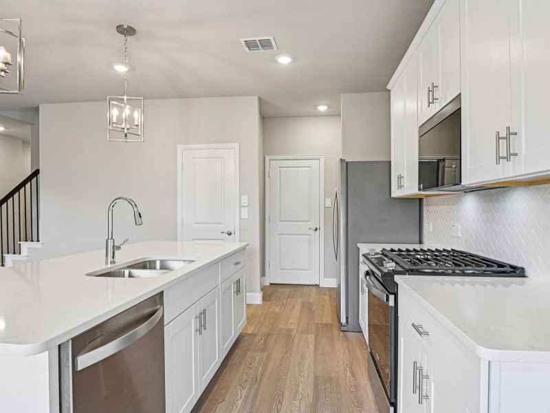 Furnished interior view inside a new home in Parks at Foster Crossing - Signature Series, Anna (Image 7). Furnished interior view inside a new home in Parks at Foster Crossing - Signature Series, Anna (Image 7).