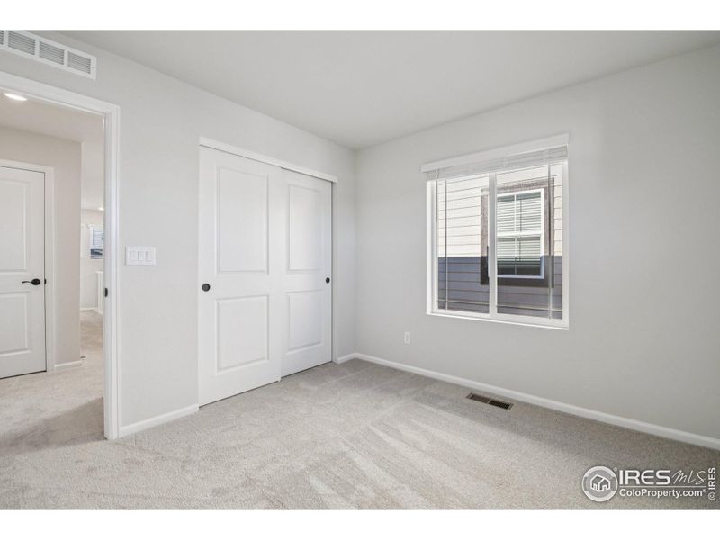 Spacious, unfurnished interior of a new home in The Villas Collection at Sterling Ranch, Littleton (Image 23).