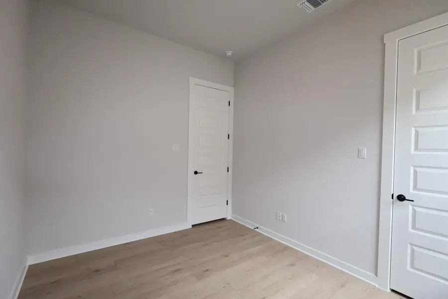 Spacious, unfurnished interior of a new home in Arbor Collection At Wolf Ranch, Georgetown (Image 8). Spacious, unfurnished interior of a new home in Arbor Collection At Wolf Ranch, Georgetown (Image 8).