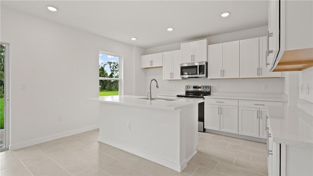 Furnished interior view inside a new home in Willowbrook North, Winter Haven (Image 6).