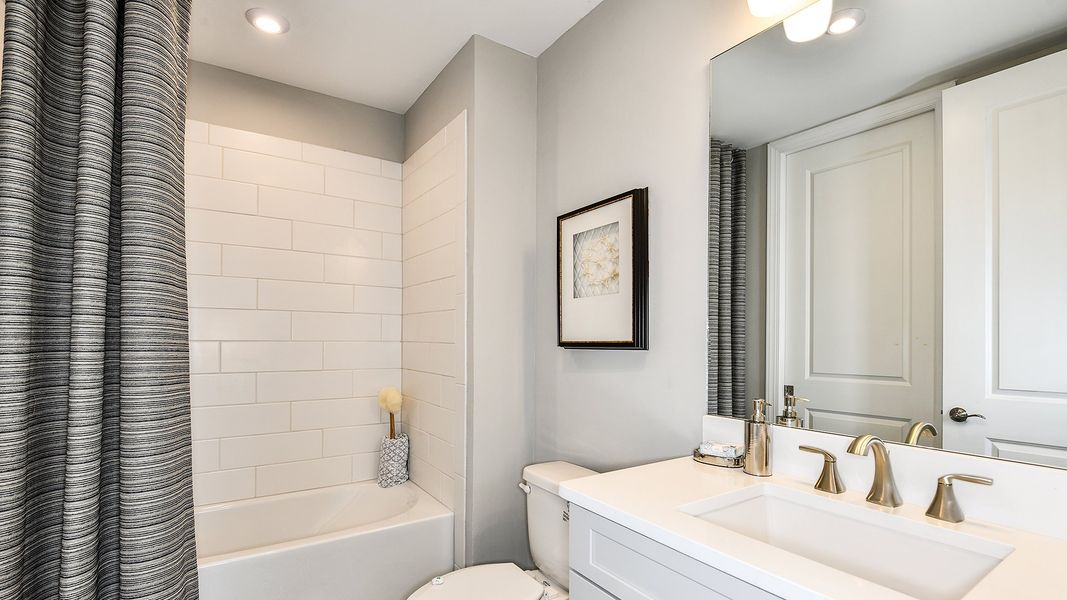 Furnished interior view inside a new home in Esplanade by the Islands Coach Homes, Naples (Image 13).