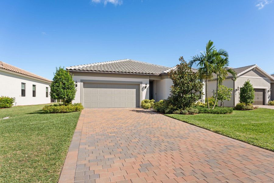 Exterior details and patio area of a home in Veranda Gardens, Port St. Lucie (Image 2).
