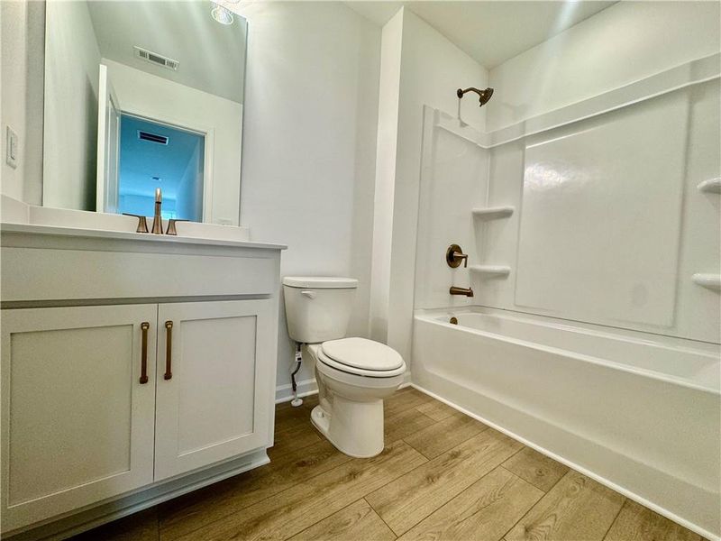 Furnished interior view inside a new home in Eastlyn Crossing, Flowery Branch (Image 9).