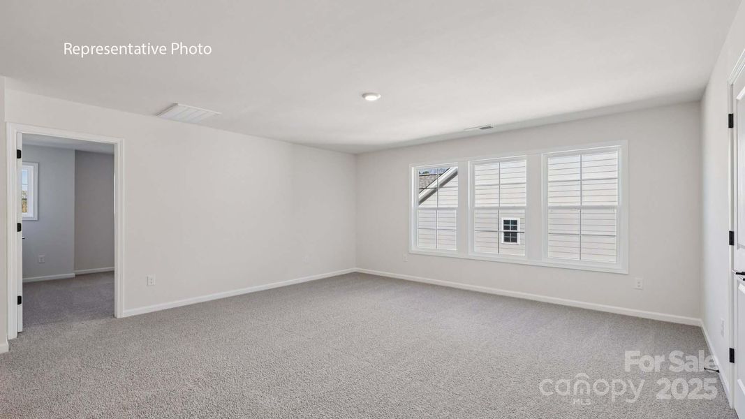 Spacious, unfurnished interior of a new home in Sanctuary at Southgate, Indian Trail (Image 32).
