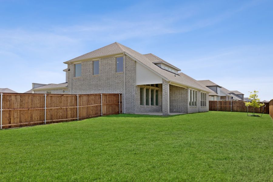 Covered Patio in the Henley home plan by Trophy Signature Homes – REPRESENTATIVE PHOTO Covered Patio in the Henley home plan by Trophy Signature Homes – REPRESENTATIVE PHOTO