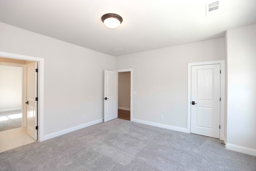 Representative unfurnished interior of a home built from the The Maddox by The Providence Group in Bellmoore Park, Johns Creek (Image 40).