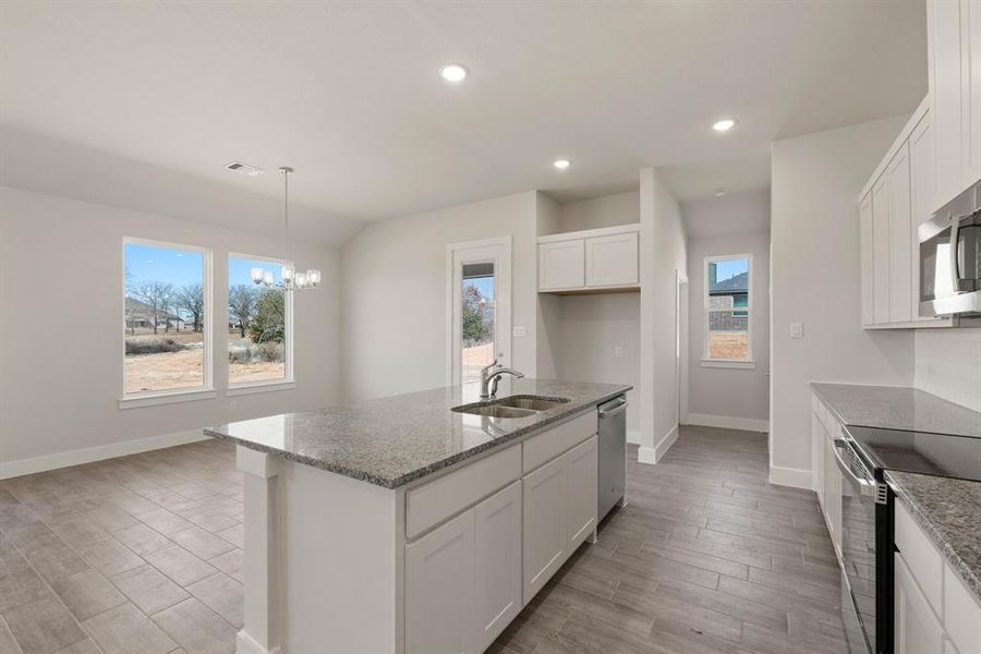Furnished interior view inside a new home in Saddleback Estates, Boyd (Image 12). Furnished interior view inside a new home in Saddleback Estates, Boyd (Image 12).