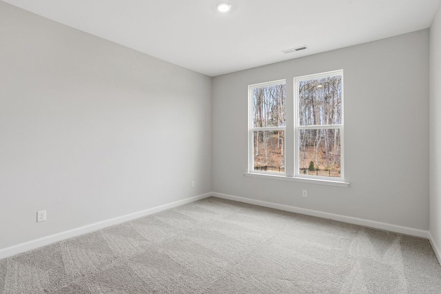 Spacious, unfurnished interior of a new home in Ovation at Sweetbrier, Durham (Image 28).