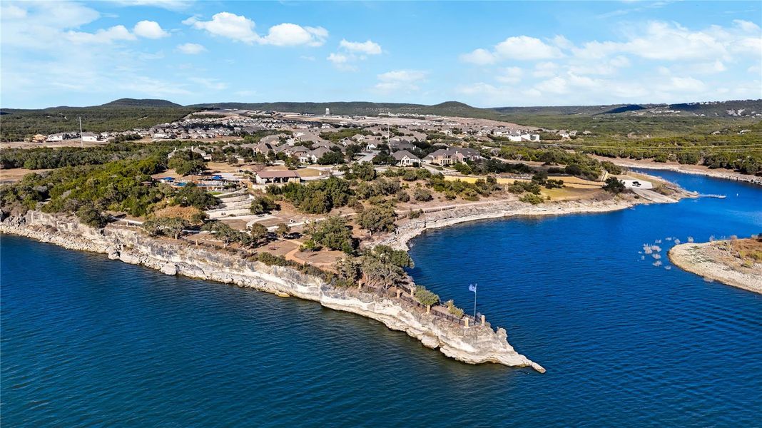 A picturesque peninsula jutting into deep blue waters offers a dramatic shoreline and scenic surroundings. A picturesque peninsula jutting into deep blue waters offers a dramatic shoreline and scenic surroundings.