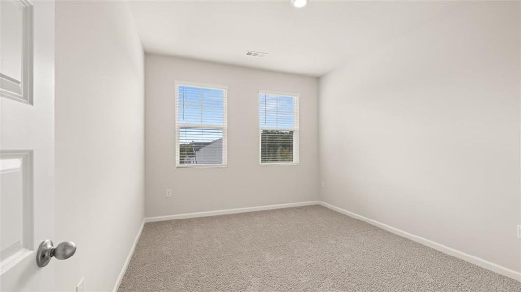Spacious, unfurnished interior of a new home in Brooks Station, Dacula (Image 29).